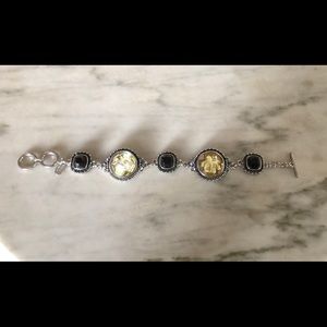 Silver-tone and bezeled-glass bracelet, intricate rose and medallion designs